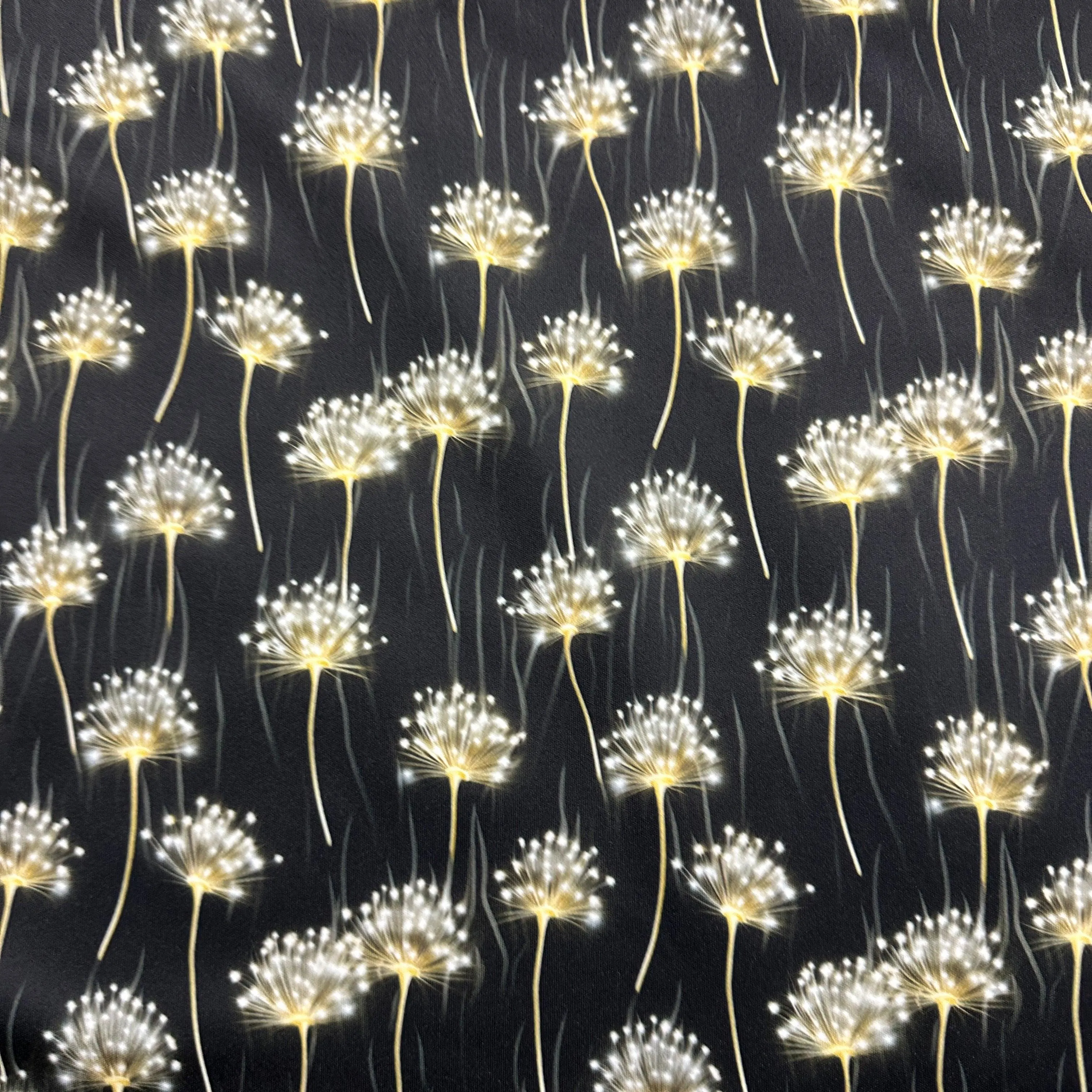 Dandelions on Black 1 mil PUL Fabric - Made in the USA