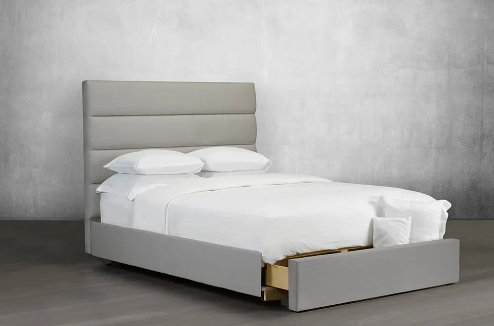 Upholstered Bed Featuring lofty tufted panels